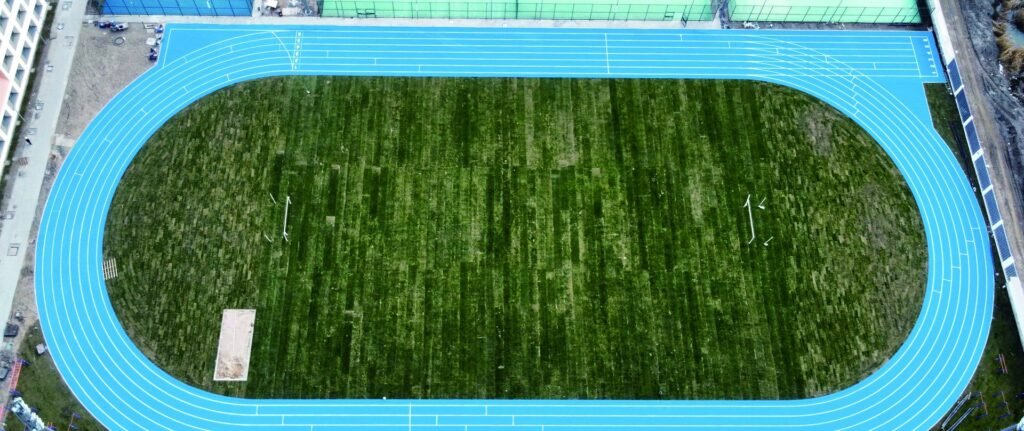 Haimen Dongbuzhou Science City Education, Culture and Sports Center running track by Topthink