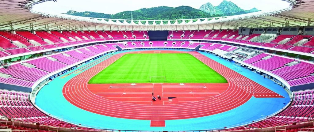 Qingdao Guoxin Sports Center running track by Topthink