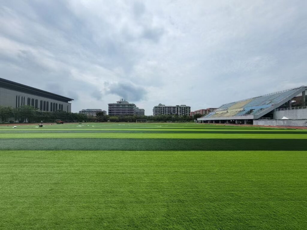 Artificial turf football field installation